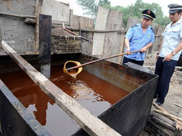 Trung Quốc bắt 32 nghi phạm sản xuất dầu ăn bẩn