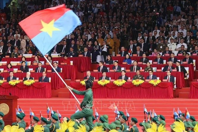 An art performance held at the grand ceremony and parade. Photo: VNA
