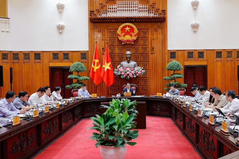 At the meeting of permanent Government members in Hanoi on May 24. Photo: VNA