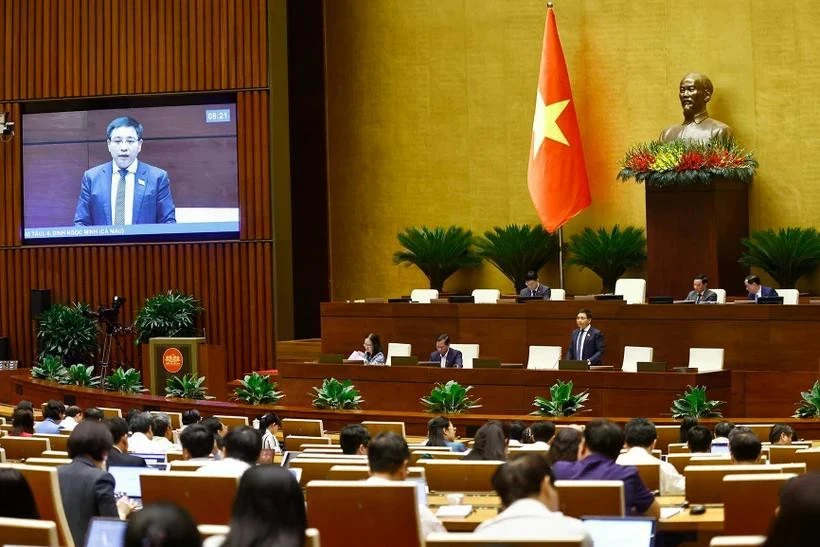 Minister of Finance Nguyen Van Thang speaks at a discussion session of the NA. Photo: VNA