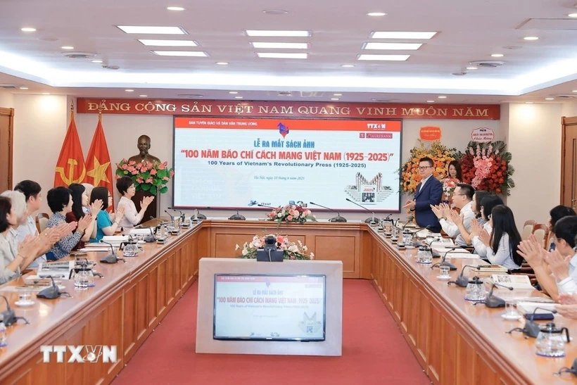 A ceremony is held to launch the photo book “100 Years of Vietnam’s Revolutionary Press (1925–2025).” Photo: VNA