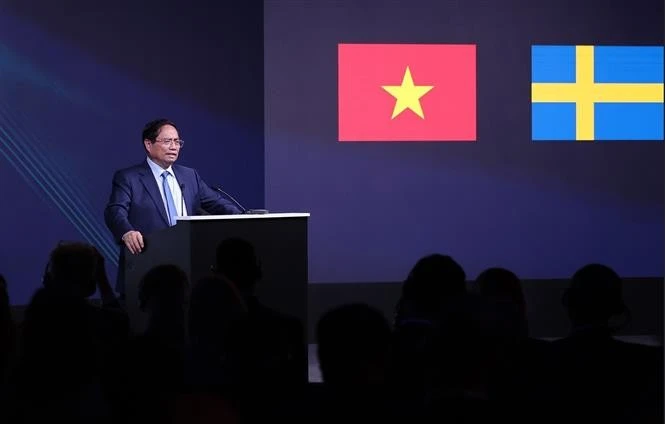 Prime Minister Pham Minh Chinh speaks at the Vietnam-Sweden Business Forum in Stockholm on June 12 (local time). Photo: VNA