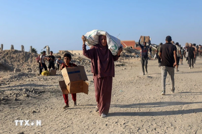 Người dân ở Gaza. Ảnh: THX/TTXVN