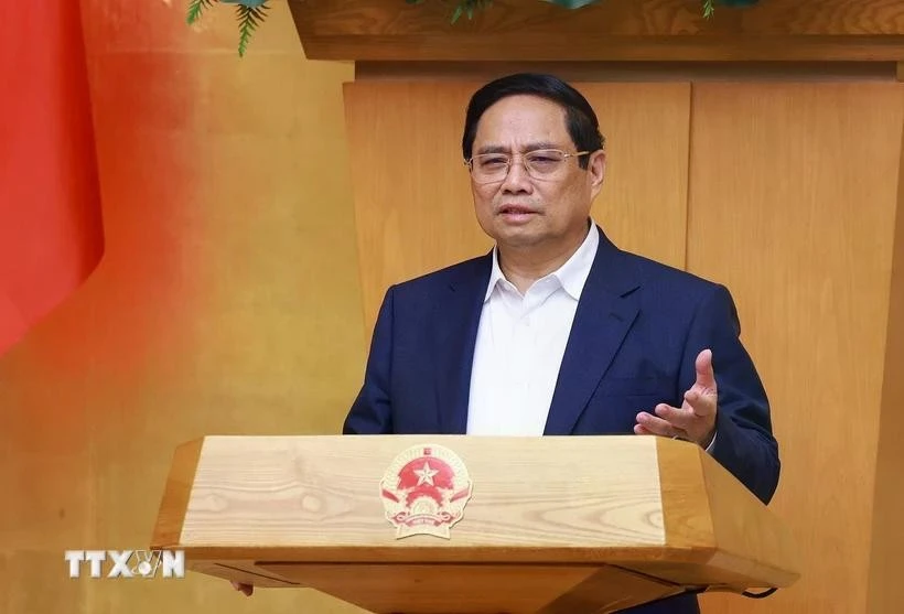 PM Pham Minh Chinh addresses the Governments regular meeting on June 4. Photo: VNA