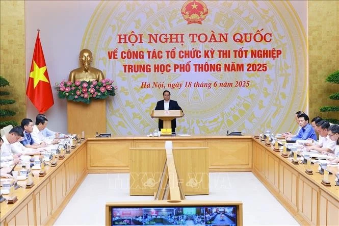 Prime Minister Pham Minh Chinh speaks at the national conference on the organisation of the high school graduation examination on June 18. Photo: VNA