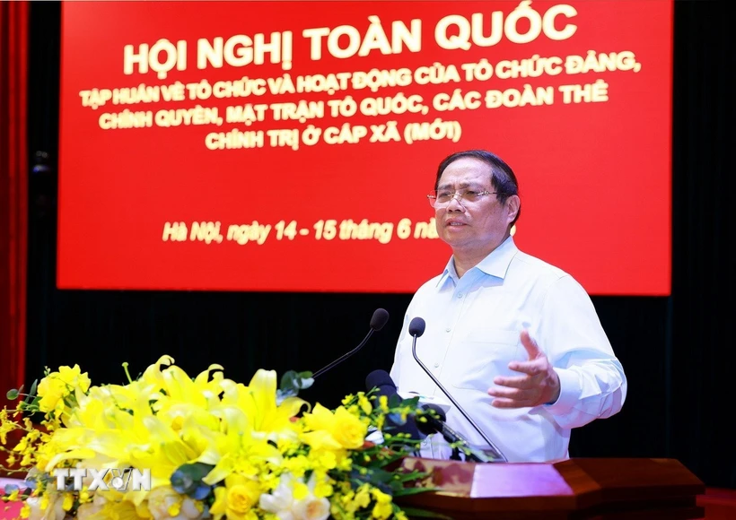 Prime Minister addresses the conference on June 15. Photo: VNA