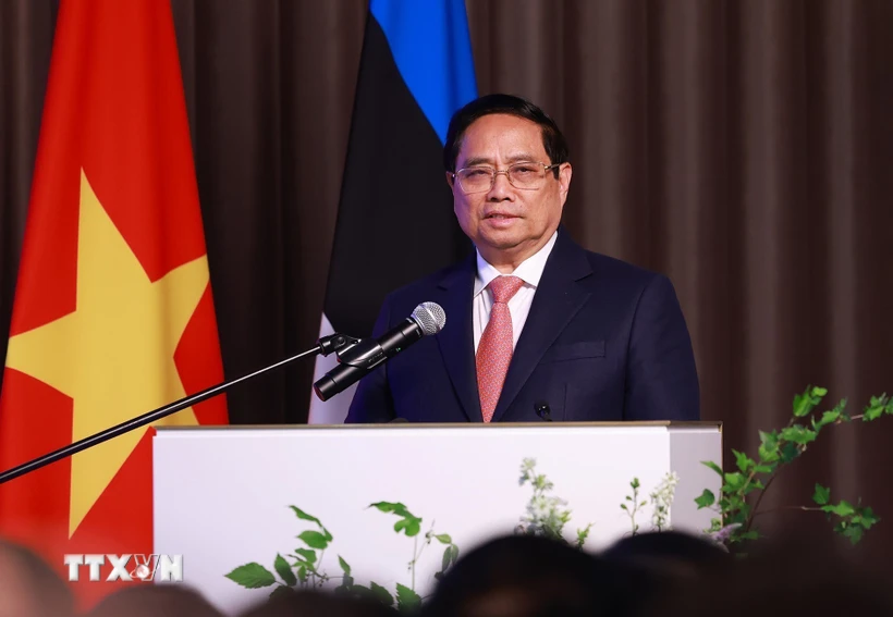Prime Minister Pham Minh Chinh speaks at the Vietnam - Estonia business forum. Photo: VNA