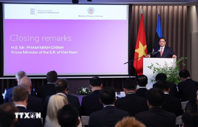 Thủ tướng Phạm Minh Chính phát biểu tại Diễn đàn doanh nghiệp Việt Nam - Estonia. Ảnh: TTXVN